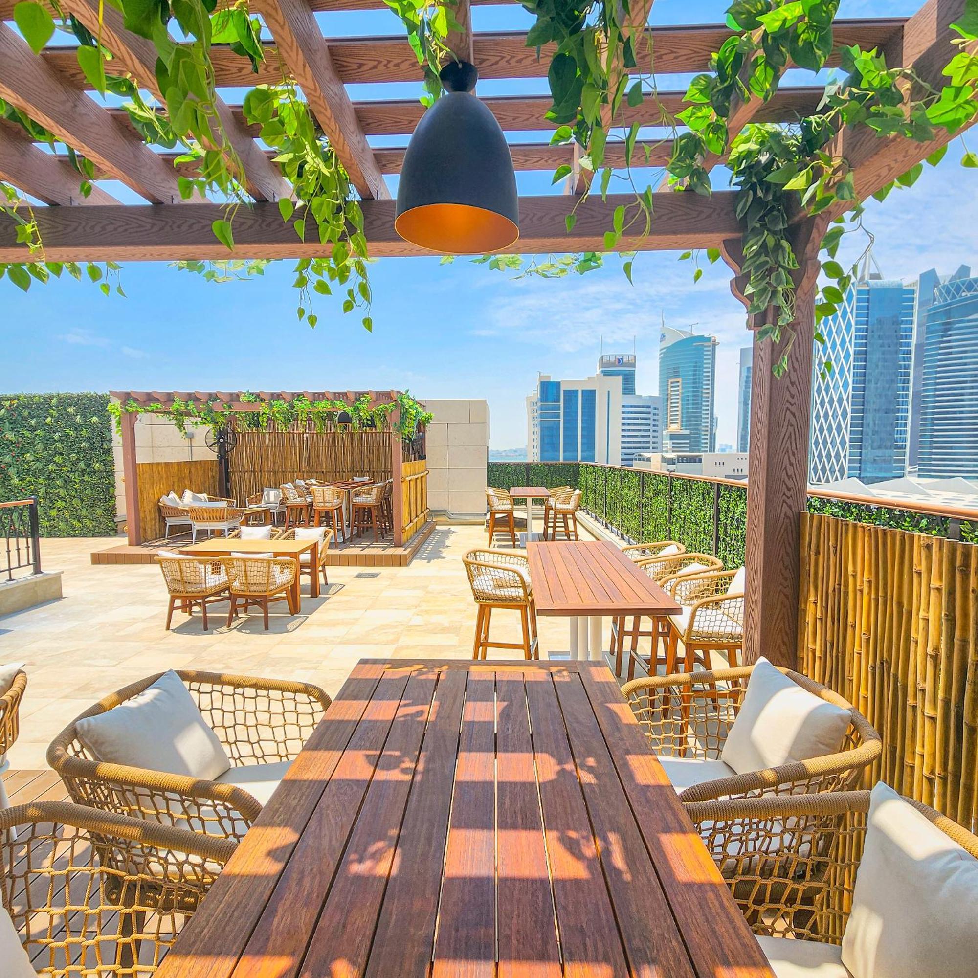 City Centre Rotana Doha Eksteriør billede The rooftop bar at the hotel