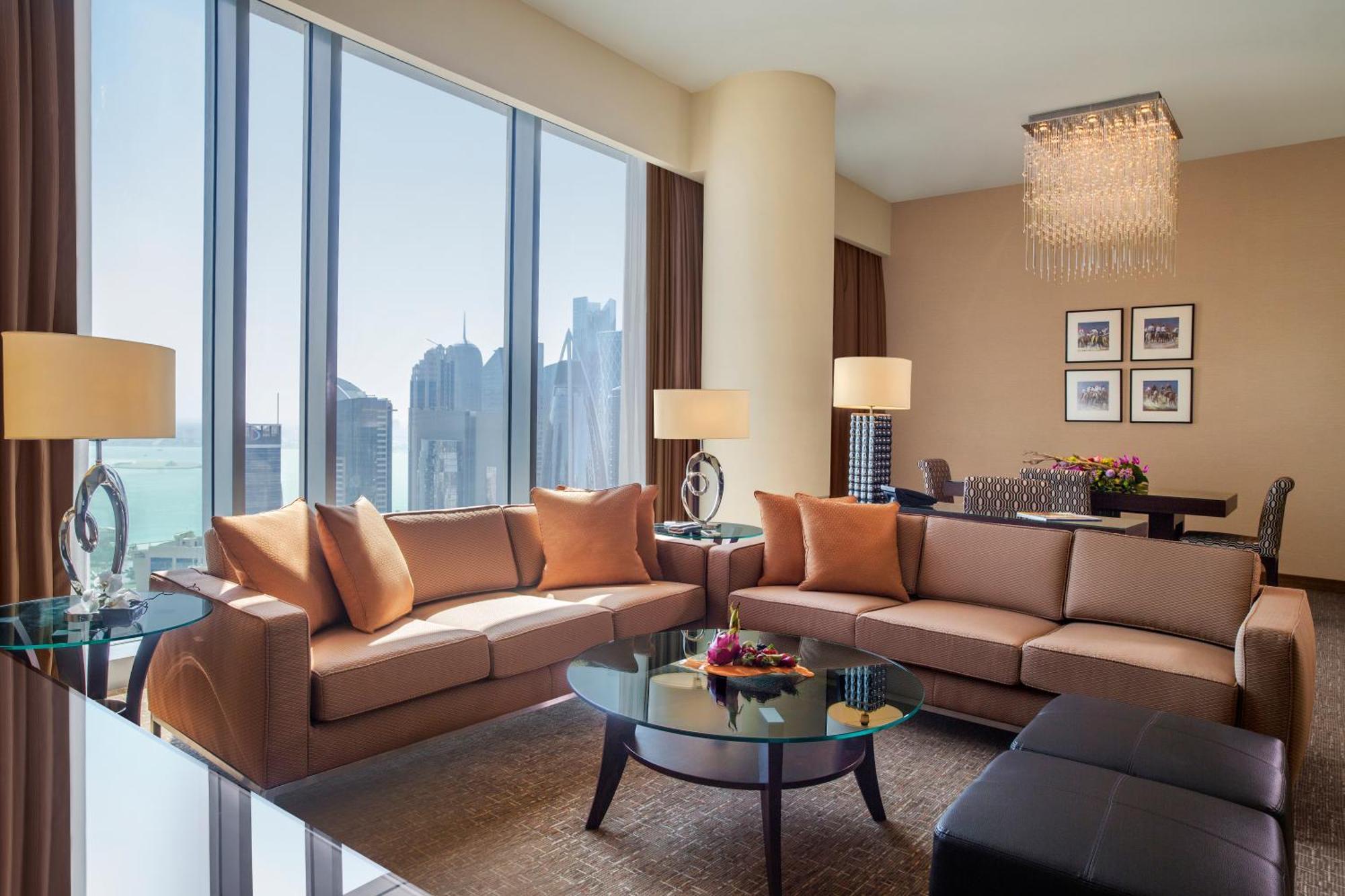 City Centre Rotana Doha Eksteriør billede A living room in a suite at the Ritz-Carlton, DIFC